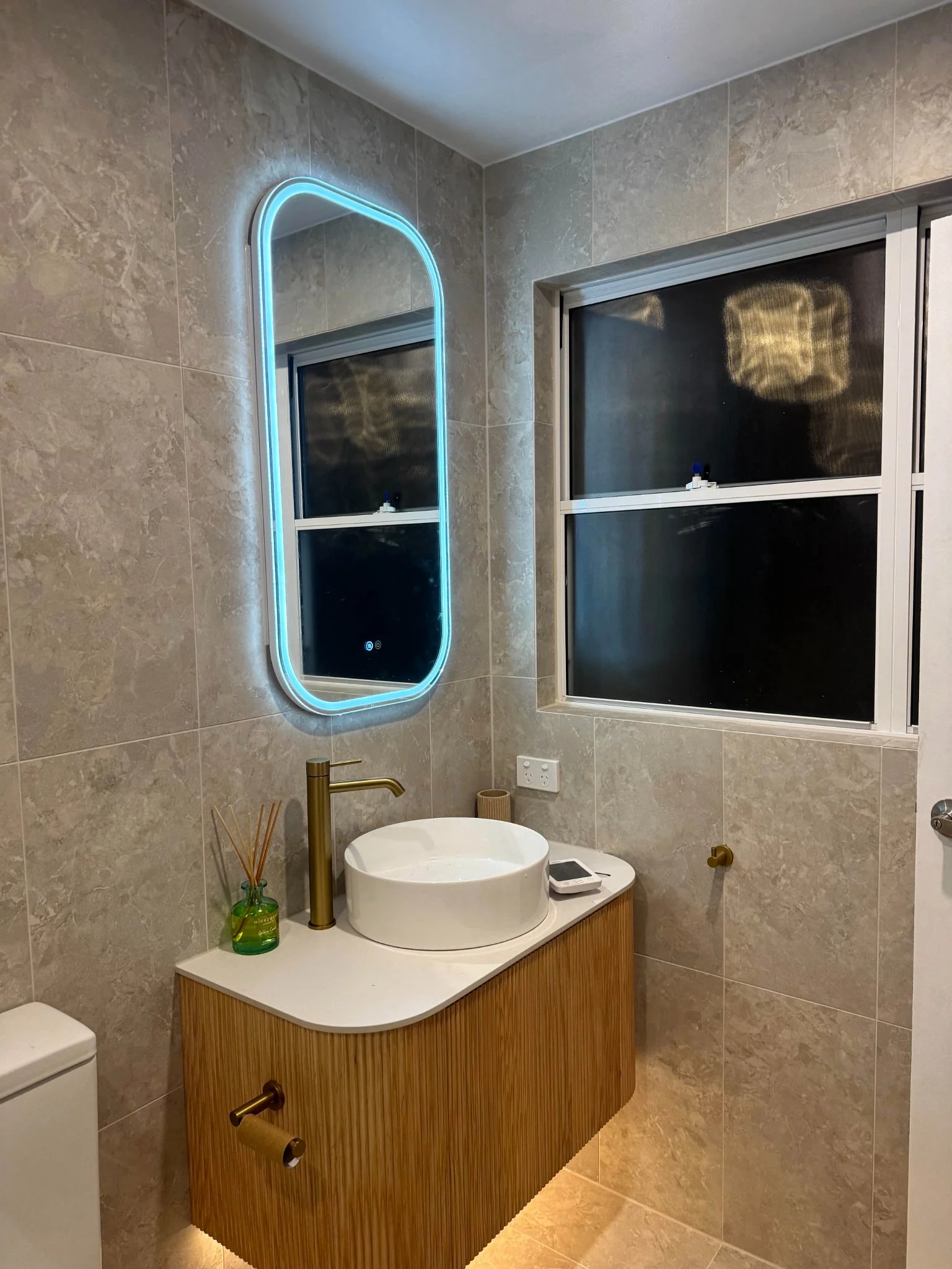 Modern tiled bathroom by D.J.R